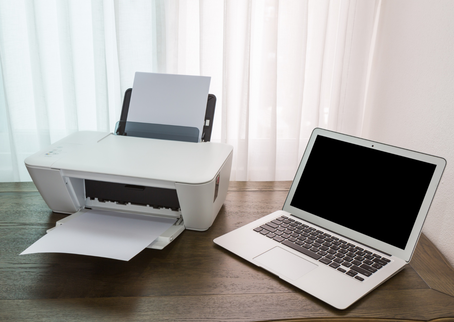 laptop-wooden-table-with-printer